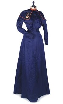 c.1914: A British NAVAL SISTER'S MESS UNIFORM, WWI :  deep blue silk two-piece dress, with capelet and high collar, together with additional red silk cuffs  23in. (58.4cm.) waist   Labelled 'Ladies Tailors, James Shoolbred & Co., Tottenham House' to waistband, and inscribed in pencil indistinctly to the collar Naval Uniform, Historical Dress, 1910s Fashion, Queen Alexandra, Period Clothing, Women's Uniforms, 20th Century Fashion, Period Outfit