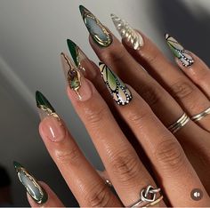 Faerie Nail Art, Cool Nail Sets, Green Groovy Nails, Nails With Gems And Charms, Short Pink And Gold Nails, Gem Stone Nail Art, Green Butterfly Nail Designs, Press On Nail Inspiration, Earthy Gel Nails