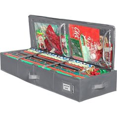 an open suitcase filled with assorted christmas items