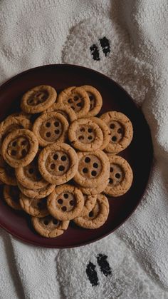 a plate filled with cookies on top of a table