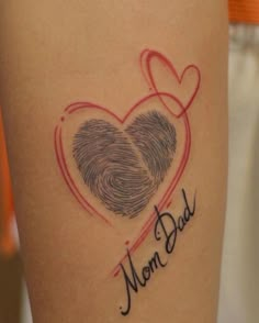 a close up of a person's arm with a fingerprint and heart on it