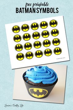 a cupcake with blue frosting and batman symbols on it, next to a printable