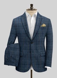 Channel boss vibes everyday with this refined Harris Tweed Gordon Blue Suit to look great in this new season. Crafted from pure wool, the suit is a stylish piece for your next elegant affair with a shade of blue that will help you charm your way through tedious tasks and an impeccable checks design that carries a timeless appeal. The suit will seamlessly blend together with your favorite shirt to create an eye catching ensemble.  Look Includes   Harris Tweed Gordon Blue Fabric  Two Button Jacket Style  Notch Lapel  Horn Royal Black Buttons  Single Vent  Three Cuff Buttons  Two Welted Back Pockets on Trousers   You can change the look during customization if required.  Lining: Viscose, Dry Clean. Navy Tweed Suit, Checks Design, Boss Vibes, Grey Tweed Suit, Herringbone Tweed Jacket, White Linen Suit, Green Velvet Jacket, Peaky Blinders Suit, Royal Blue Suit