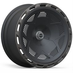 a black wheel with holes on the side and spokes at the center is shown