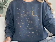 Get cozy and embrace the spooky season with this Comfort Colors sweatshirt featuring a vintage-inspired design of celestial bats and stars. This sweatshirt offers both comfort and style for the fall season. **Fabric Contents - 80% ring-spun cotton, 20% polyester fleece - Garment-dyed for a unique, lived-in look **Care Instructions - Machine wash: cold (max 30oC or 90oF) - Non-chlorine bleach as needed - Tumble dry: low heat - Do not iron or dry clean **Fit - Relaxed fit with ribbed collar, cuffs Vintage Pullover, Comfort Colors Sweatshirt, Vintage Pullovers, Vintage Inspired Design, Getting Cozy, Nutcracker, Spooky Season, Fall Season, Comfort Colors