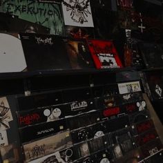 there are many records on the shelves in this room