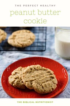 the perfect healthy peanut butter cookie on a red plate next to a glass of milk