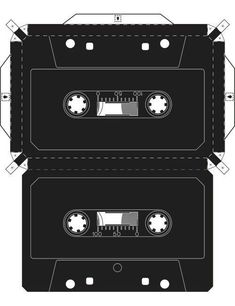 an old school cassette cut out into two pieces