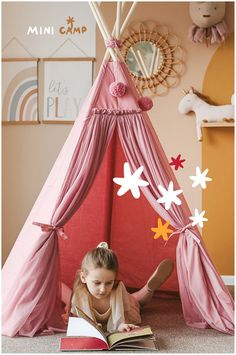 Ignite the imagination with MINICAMP's Fairy Tale Play Tent, beautifully adorned with soft tulle and charming pom-poms. This sanctuary, perfect for creative play, brings fairy tales to life in playrooms, living areas, or gardens. Lovingly hand-sewn in Lithuania, it showcases our dedication to quality and childhood wonder. Ideal for memorable occasions or daily fun, this teepee is a gorgeous decor piece that promises endless entertainment and joy. Fairy Teepee, Fairy Tent, Boho Tent, Play Teepee, Kids Teepee Tent, Rose Fairy, Toddler Christmas Gifts, Kids Play Tent, Tulle Curtains