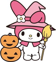 a hello kitty holding a broom next to two pumpkins