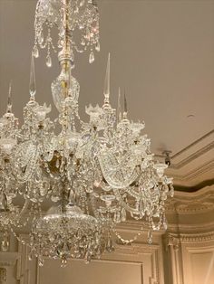 a large crystal chandelier hanging from the ceiling