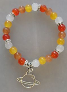 Handmade Bracelet in the colours of Jupiter. Glass Bracelet Ideas, Orange Beaded Bracelets, Bracelet Ideas Glass Beads, Glass Beads Bracelet Ideas, Glass Bead Bracelet Ideas, Pulseras Aesthetic, Girly Bracelets, Crystal Bead Jewelry