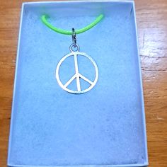 Handmade Peace Sign Necklace Made With Silver Peace Sign On Green Cord Chain. Pendant Peace Sign Measures 18mm In Antique Silver. The Peace Sign Is A Symbol Of Peace And Hope. Chain Is Adjustable With Claw Clasp Closure. Box Display Only. Pouch Included Free. New And Unused Item. Contact Me With Any Offers. Peace Sign Necklace, Symbol Of Peace, Sign Necklace, Box Display, The Peace, Chain Pendant, Peace Sign, Womens Jewelry Necklace, Antique Silver