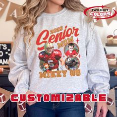 Our customizable senior mom football collage sweatshirt is the perfect way to show your support for your favorite football player in his last high school season. This unique design allows you to showcase your senior athlete with up to four photos, creating a one-of-a-kind personalized shirt perfect for Senior Night, regular game days or any time. Your player's "today" photo is showcased along with 1-3 "then" photos. At the bottom of the design, add your senior's name and number or other text. Yo Senior Mom Gift Ideas, Mom Senior Night Outfit, Senior Night Mom Outfit Ideas, Senior Baseball Mom Shirts, High School Football Game Outfit Mom, Customizable Casual Sweatshirt For Football Season, Team Spirit Sweatshirt With Custom Print For Sports Events, Customizable Sports Fan Sweatshirt For Game Day, Customizable Sports Fan Sweatshirt For Sports Season