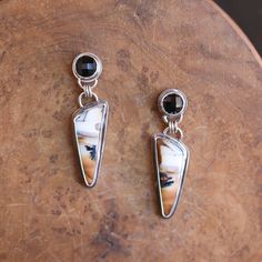 This one-of-a-kind pair of Rose Cut Faceted Black Agate and Scenic Dendritic Agate drop Earrings will knock your socks off! The Earthy toned, natural, Dendritic Agate hangs below the faceted black agate posts with three sterling Silver Rings. All Metal is .925 Sterling Silver. The stunning pair of bottom stones are gently colored with warm hues of amber and brown to black and contrast boldly with the faceted black agate top posts. Truly a pair of statement earrings that respect the nature from w Luxury Agate Earrings With Natural Stones, Polished Onyx Earrings For Gift, Metal Smithing, Silver Statement Earrings, Dendritic Agate, Boho Pendant, Agate Jewelry, Black Agate, Turquoise Pendant