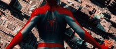 the amazing spider - man is standing in front of a city