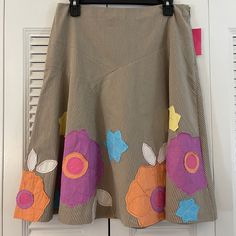 This Beautiful Sunny Leigh Floral Skirt Has Gorgeous Embroidery. Waist 16” Length 24” Side Zipper. 100% Cotton. Perfect For Year Round Wear. Spring Embroidered Beige Skirt, Beige Patchwork Skirt For Spring, Spring Brown Patchwork Skirt, Brown Lined Skirt For Spring, Spring Brown Relaxed Fit Skirt, Spring Brown Skirt, Color Orange, Floral Skirt, Side Zipper