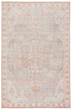 an antique rug with various colors and patterns on the carpet, including blue, pink, orange