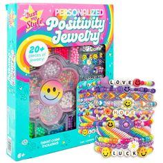 a box of beads and bracelets with the package in it's display case