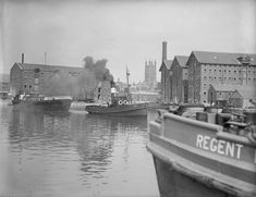 Steam boats moored at Gloucester docks c 1925 c Historic England AA53_10346 West England, Uk History, Gothic Cathedral, Industrial Architecture, Steam Boats, South West