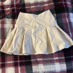 Xs Brand New Never Worn Cream Tennis Skirt Beige Pleated Tennis Skirt For Summer, Beige Stretch Cotton Mini Skirt, Beige Cotton Stretch Mini Skirt, Summer Beige Pleated Skort, Beige Pleated Skort For Summer, Beige Stretch Mini Skirt With Lined Detail, Summer Stretch Beige Skirt, Beige Stretch Skort, Beige Stretch Skort With Lined Skirt