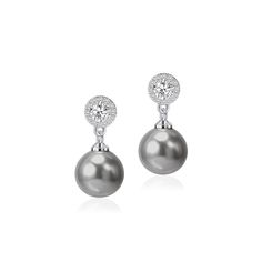 PRICES MAY VARY. Elegant Design: These dangle earrings feature lustrous pearls and sparkling cubic zirconia stones set in 925 sterling silver post for a timeless and sophisticated look. Quality Materials: Shell pearl, Brass with platinum plated,Crafted with genuine 925 sterling silver and high-quality cubic zirconia stones for lasting beauty and durability. Pearl Earrings Size:Length 2cm/0.78inch,10MM shell pearl,1MM cubic zirconia crystal. Quality Materials: Crafted with genuine 925 sterling si Dangle Pearl Earrings, Pearl Earrings Dangle, Brides And Bridesmaids, Pearl Drop Earrings, Pearl Drop, Wedding Bridesmaids, Sterling Earrings, Elegant Design, Cubic Zirconia