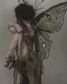 a drawing of a woman with a butterfly on her back