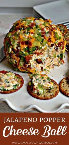 jalapeno popper cheese ball on a plate with other appetizers