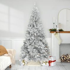 a white christmas tree in a living room