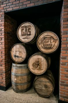 several wooden barrels stacked on top of each other