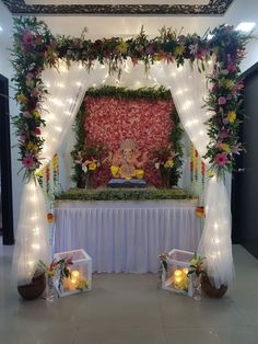 an altar decorated with flowers and candles