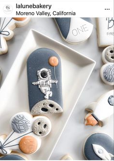 some cookies are decorated with space related items