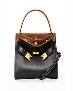 Tory Burch "Lee Radziwill" bag in calf leather, cotton, and suede. Leather top handle with 6" drop. Adjustable, removable crossbody strap with 56.50" drop. Belted top. Dual compartments. 6.4"H x 7.6"W x 3.8"D. Imported. Tory Burch Lee Radziwill Double Bag, Lee Radziwill Double Bag, Lee Radziwill, Digital Wardrobe, Bowler Bag, Womens Designer Handbags, Dream Bags, Top Handle Handbags, Girly Accessories