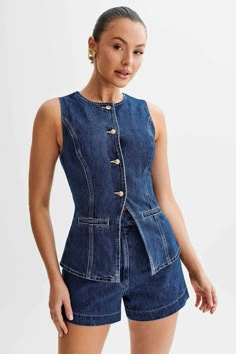 Denim 2pcs set, denim vest, round neck, sleeveless, denim short Model size small 5'10" 34-24-38,Dress 2 S: Top Bust 33, Top length 23.6, Pant length 13.7, Waist 28M: Top Bust 35, Top length 24, Pant length 14, Waist 30L: Top Bust 37, Top length 24.4, Pant length 14.5, Waist 32XL: Top Bust 40, Top length 24.8, Pant length 15, Waist 352XL: Top Bust 42, Top length 25, Pant length 15, Waist 36Made In: CHINAFabric Contents: 35%POLYESTER 65%COTTON Gucci Summer Workwear Tops, Denim Waistcoat, Moda Denim, Denim Outfits, Gilet Long, Chic Aesthetic, Moda Jeans, Long Vests, Princess Seams