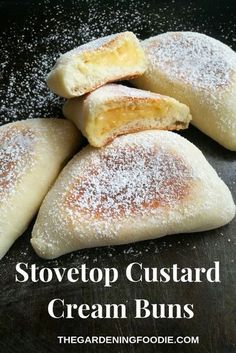 several creme buns with powdered sugar on top and text overlay reading stovetop custard cream buns