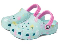 Crocs Kids Classic Clog - Seasonal Graphic (Toddler) - Kid's Shoes : Pure Water/Multi/Dream Stars : Lounge comfortably or hang with friends outdoors wearing Crocs Kids Classic Clog - Seasonal Graphic (Toddler). Synthetic upper. Synthetic lining and insole. Wide toe box. Cut-out designs allover for breathability. Pivoting heel straps for a more secure fit. Open back. Seasonal graphic prints allover. Synthetic outsole. Imported. Measurements: Weight: 3 oz Product measurements were taken using size Cute Summer Clogs For Playtime, Cute Summer Playtime Clogs, Crocs Clogs Outfits Style, Croc Ideas, Friends Outdoors, Clogs Outfits, Kids Crocs, Crocs Women, Book Wishlist