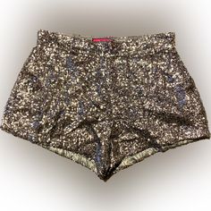 Live Up To Your High Standards In This Flashy, Silver Color Pocketless Sequin Shorts! They Feature A High Waist, Side Zipper Closure With A Relaxed Fit. Shorts Include A Full Lining. Materials & Care: 100% Polyester Hand Wash Cold. Hang Dry. Measurements: (Approximate) Approx. 2 1/2” Inseam & 11” Side Seam Casual Party Bottoms With Short Inseam, Casual Bottoms With Short Inseam For Party, Trendy Party Bottoms With Short Inseam, Lycra Shorts, Sparkle Shorts, Silver Shorts, Black High Waisted Shorts, Wrap Shorts, Sequin Shorts