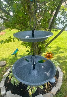 three tiered bird bath in the garden