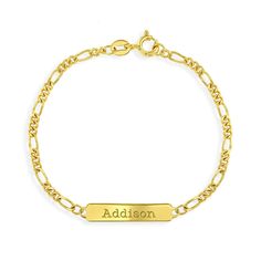 Delight your favorite little loved one with this precious ID bracelet. Crafted in yellow gold flashed 925 sterling silver, this charming design features a rectangle-shaped engravable ID tag centered on a Figaro chain. Polished to a bright shine, this 5.5-inch bracelet secures with a spring-ring clasp. Order a traditional ID bracelet today and we'll neatly package it into its own lovely gift box! Boys Bracelet, Teen Ring, Teen Necklaces, Teen Earrings, Boys Bracelets, Baby Necklace, Teen Jewelry, Baby Earrings, Kids Rings