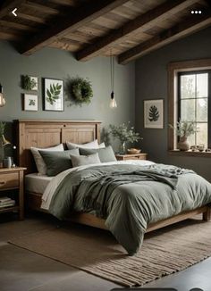 a bed sitting in a bedroom next to a window with potted plants on it