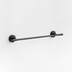 an image of a black towel bar on the wall