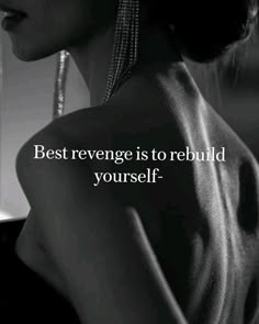 a woman with her back turned to the camera and text that reads, best revenge is to rebuld yourself