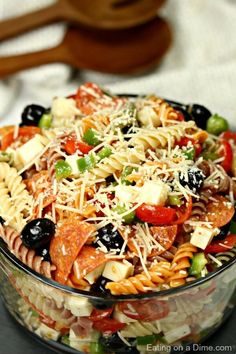 pasta salad in a glass bowl with text overlay that reads easy to make italian pasta salad