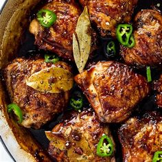 a pan filled with meat and green peppers