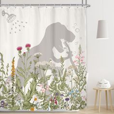 a shower curtain with an image of a bear playing the piano surrounded by wildflowers