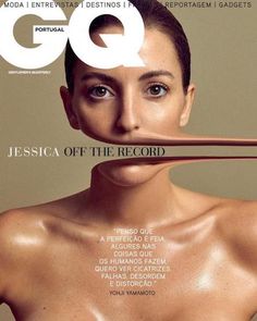 a magazine cover with an image of a woman's face and the word gq on it