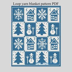 a cross stitch pattern with houses, trees and snowflakes on the front cover