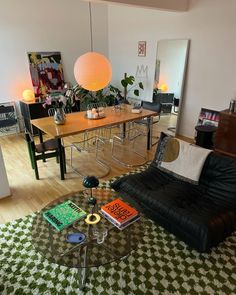 a living room filled with lots of furniture and decor