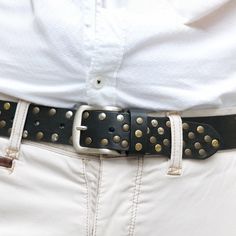 Handmade studded belt in black greased vegetable tanned cowhide leather 3.5 cm wide. The buckle and studs are in metal (nickel free) in different colours. Completely handmade in Florence with Italian materials and accessories.  Every single belt is custom made for you. In any case it is also possible to easily adjust it independently as the buckle is completely removable. Tan Leather Belt, Leather Craftsmen, Tan Cowhide, Black Bull, Studded Belt, Brown Leather Belt, Metal Accessories, Black Leather Belt, Suspender Belt