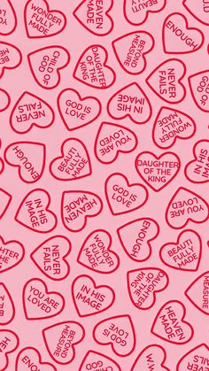 many hearts with words written on them in red and black ink against a pink background